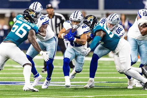 Who is the Dallas Cowboys Running Back, and Why Do They Always Seem to Outrun Expectations?